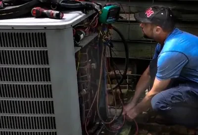 Joe Shearer diagnosing an air conditioning repair in Tallahassee