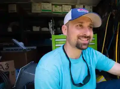 Joe Shearer of Precision Air Conditioning during HVAC repair work
